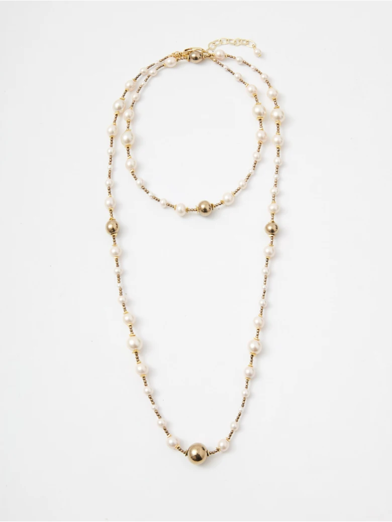 Long necklace made of natural pearls and hematite