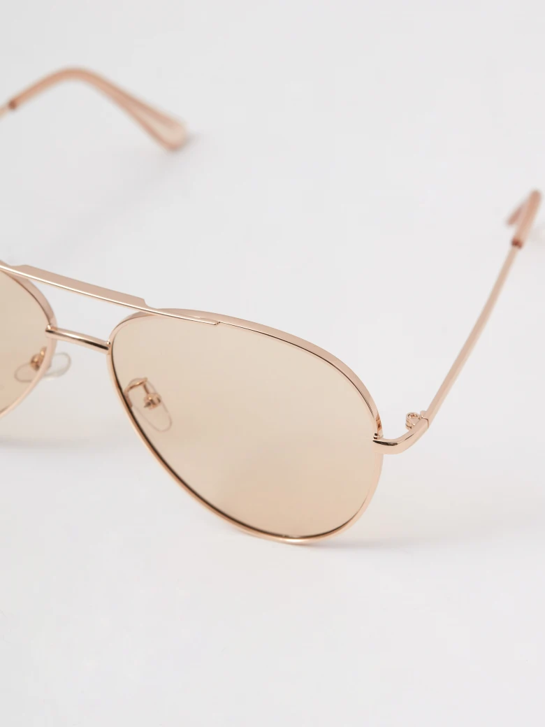 Gold-colored sunglasses
