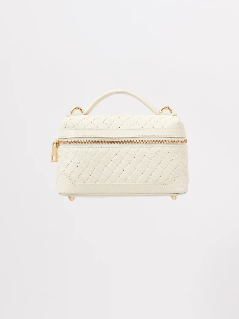 Cream-colored quilted satchel