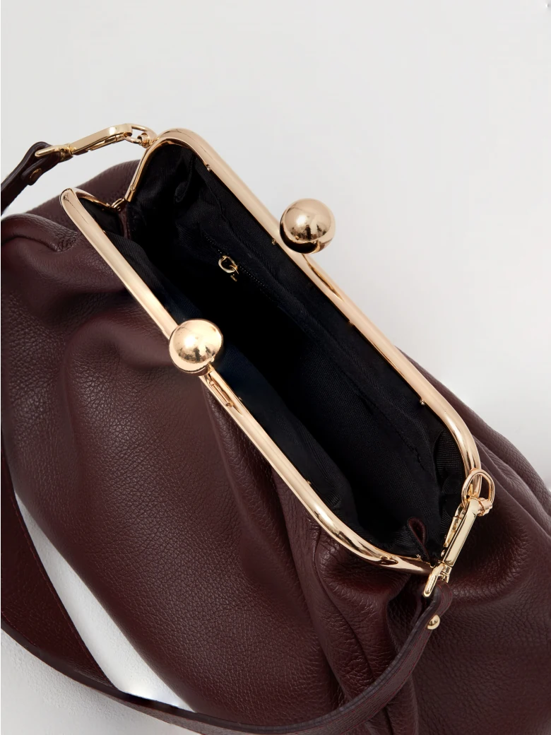 Elegant burgundy handbag with ruffles