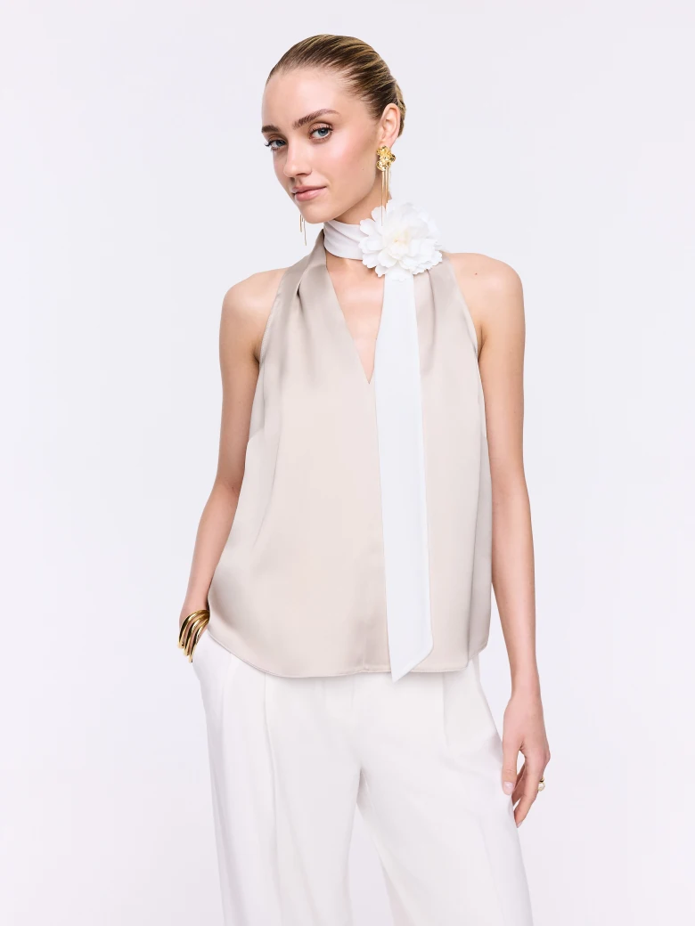 A satin blouse in a powder pink shade