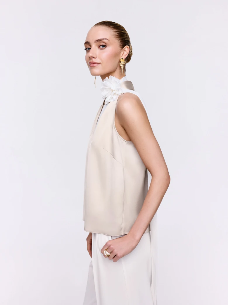 A satin blouse in a powder pink shade