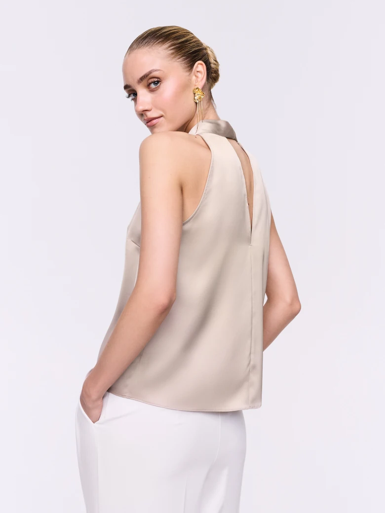 A satin blouse in a powder pink shade