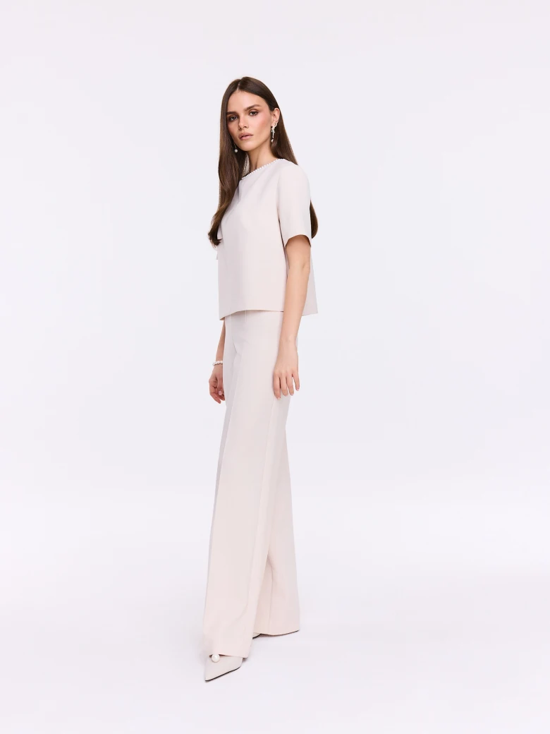 Beige boxy blouse with pearl collar