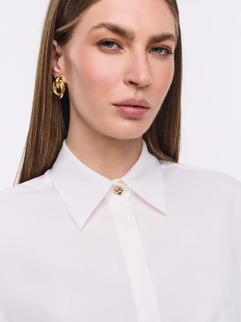Classic white shirt with jeweled button