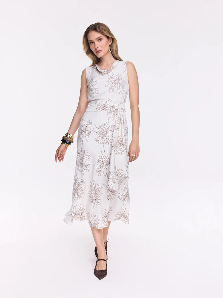 White midi dress with a leaf pattern