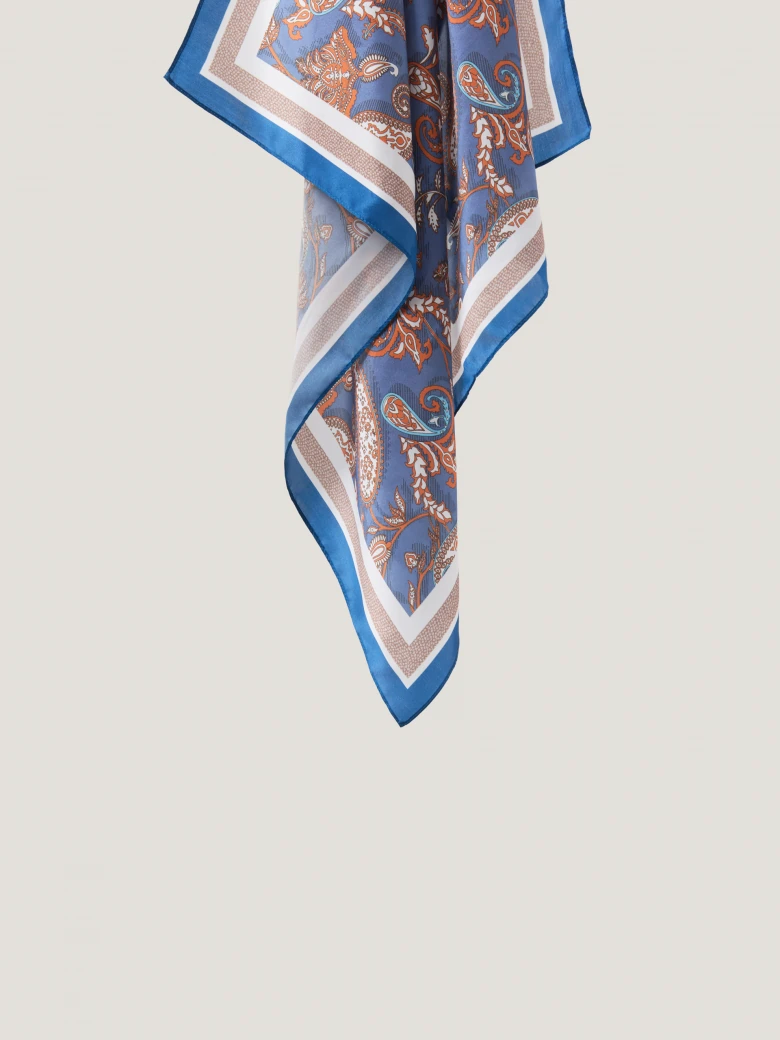 A silk scarf with a paisley pattern