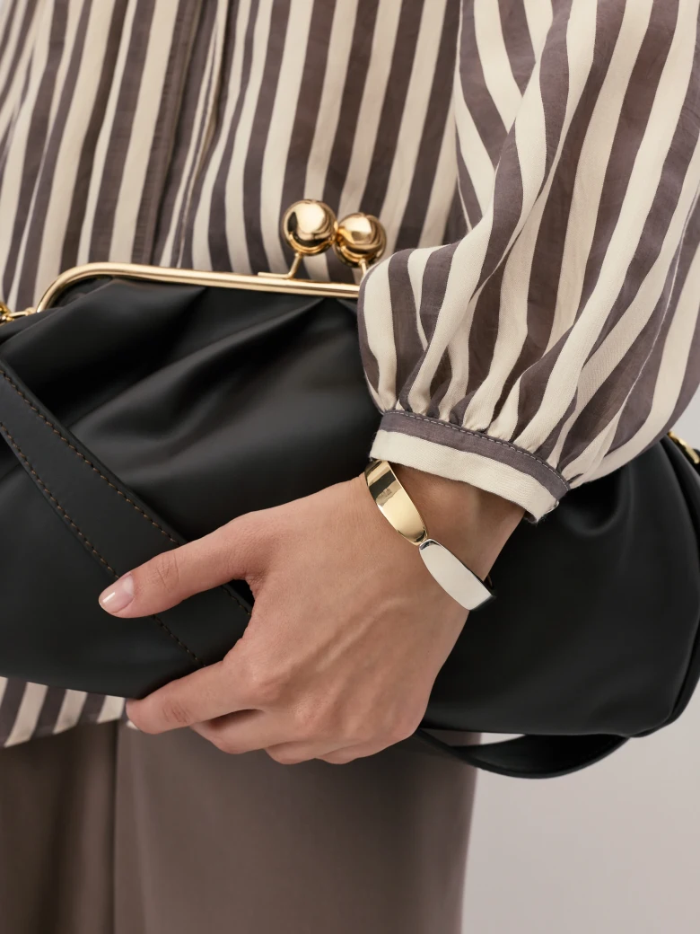 A dark chocolate-coloured leather handbag