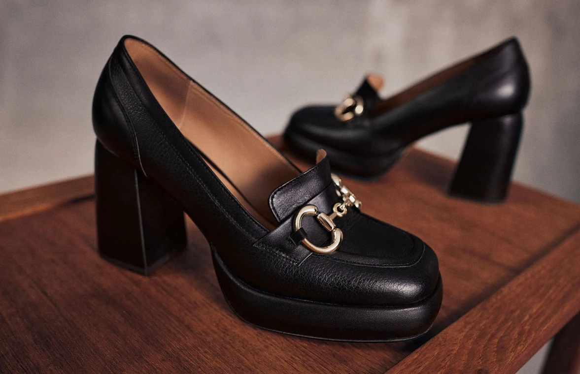 Black leather platform shoes with buckles