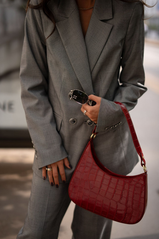 Leather burgundy handbag with animal texture