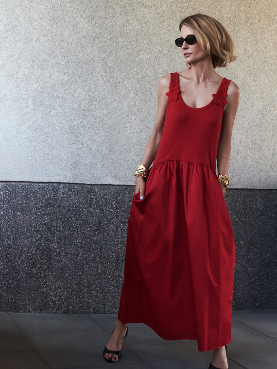 Red midi dress with decorative straps