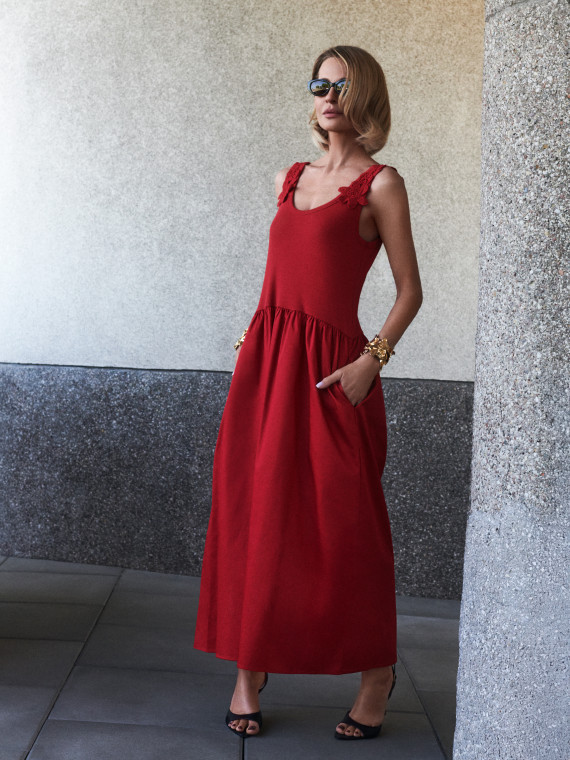 Red midi dress with decorative straps