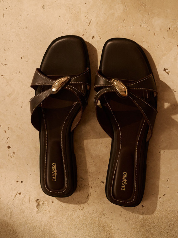 Brown leather flip-flops with decorative buckles