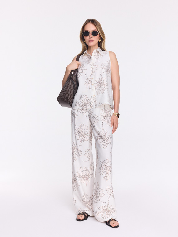 White wide-leg pants with a floral print