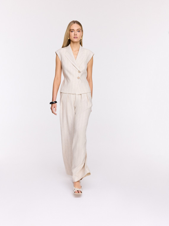 Light beige high-waisted ribbed trousers