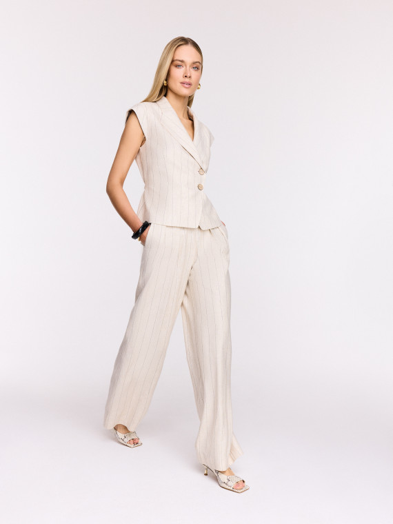 Light beige high-waisted ribbed trousers