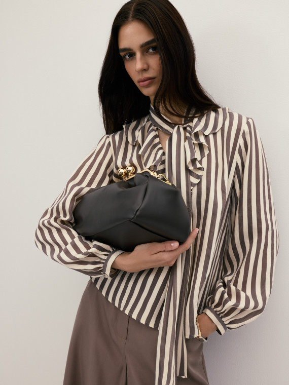 A dark chocolate-coloured leather handbag