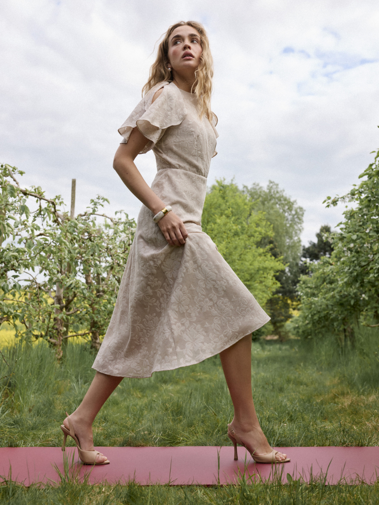 Beige midi dress with a jacquard pattern
