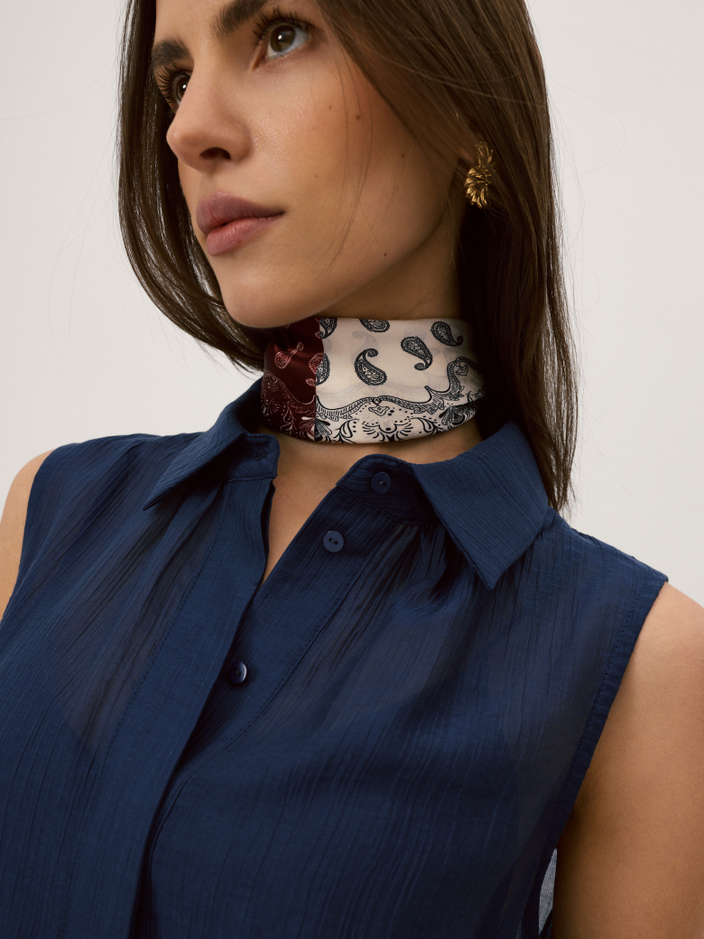 A silk scarf with a paisley pattern